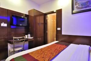 Postel nebo postele na pokoji v ubytování Hotel Nirmal Mahal - Paharganj - New Delhi