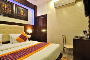 Postel nebo postele na pokoji v ubytování Hotel Nirmal Mahal - Paharganj - New Delhi