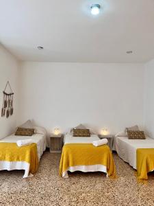Llit o llits en una habitació de Ca La Pia