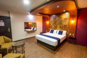 Postel nebo postele na pokoji v ubytování Hotel Rose Ensenada