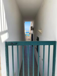 Ένα ή περισσότερα κρεβάτια σε δωμάτιο στο Stella di Mare