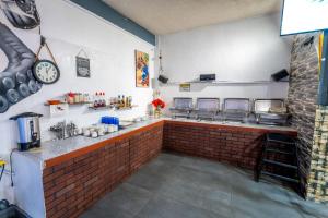Kuchyň nebo kuchyňský kout v ubytování Hotel Rose Ensenada + 37 fotografií
