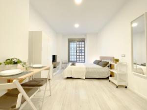 Posteľ alebo postele v izbe v ubytovaní Estudio en Malaga centro