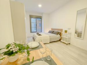 Posteľ alebo postele v izbe v ubytovaní Estudio en Malaga centro