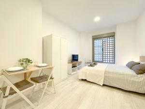 Posteľ alebo postele v izbe v ubytovaní Estudio en Malaga centro