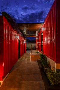 a row of red stalls in a building at Hotel del Pescador in Ajijic