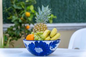 a bowl of fruit sitting on a table at Casita Bonita - with private garden near beach in Jávea in Jávea