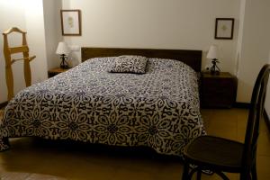 Llit o llits en una habitació de Casa el Tilo