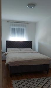 Postel nebo postele na pokoji v ubytování Garden Doboj