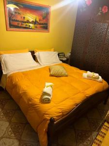 Posteľ alebo postele v izbe v ubytovaní Cottage Gole Alcantara Pafumi