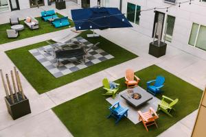 an overhead view of a patio with chairs and a table at Sonder at East 5th in Austin