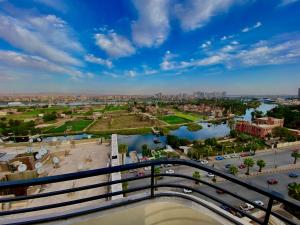 a view of a city with a bridge over a river at كورنيش النيل البحر الاعظم -Nile corniche albahr alaeizam in Cairo