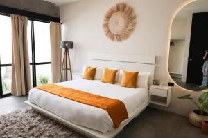 Postel nebo postele na pokoji v ubytování Aura Hotel B&B