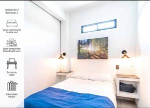 1 dormitorio con 1 cama y una foto en la pared en Great location Apartment in Pachuca en Coscotitlán