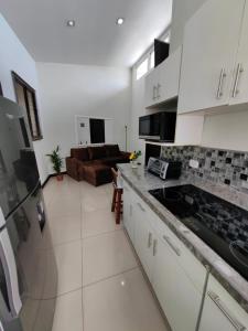 Kuchyň nebo kuchyňský kout v ubytování Apt Morpho Cas'Aguacate close to Airport, Pedregal, Centro Convenciones