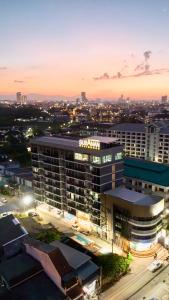 a rendering of a starrett building at dusk at SUBANAN Residence - SHA Extra Plus Certified in Ban Kohong