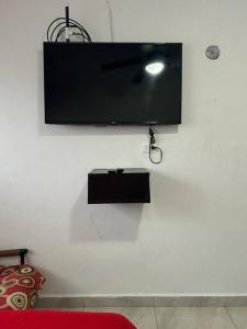 TV a/nebo společenská místnost v ubytování Casa La Tabasqueña