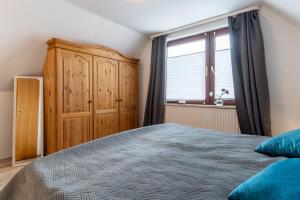 Ένα ή περισσότερα κρεβάτια σε δωμάτιο στο Lukas Haus Laffina