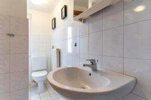 Ένα μπάνιο στο Lukas Haus Laffina