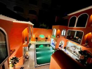 an aerial view of a house with a swimming pool at L’abri Retreat _ Venuestay in Tam Ðảo