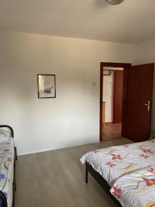 Posteľ alebo postele v izbe v ubytovaní Apartments Lili I