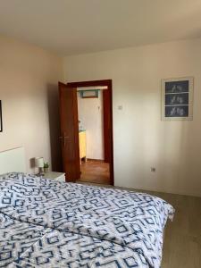 Posteľ alebo postele v izbe v ubytovaní Apartments Lili I
