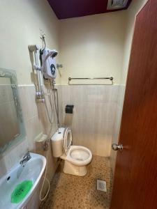 Koupelna v ubytování Ezzy In Hotel