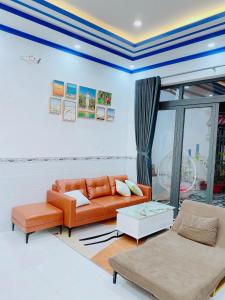 Uma área de estar em Minh Hiếu - Villa 3 rooms