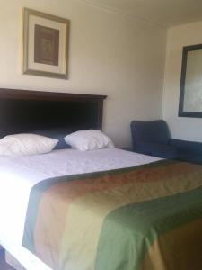 Postel nebo postele na pokoji v ubytování Del Rancho Motel