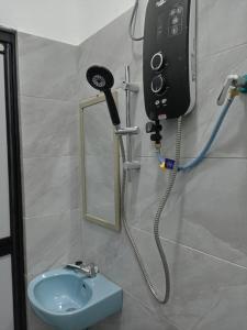 Ett badrum på KZ Roomstay
