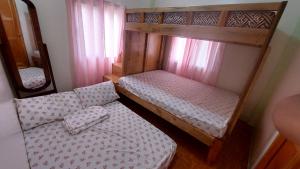 Postel nebo postele na pokoji v ubytování Mariden Resort & Homestay Siargao + 32 fotografií