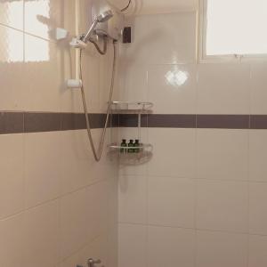 Koupelna v ubytování Abihon HoferHaus Mactan Guesthouse
