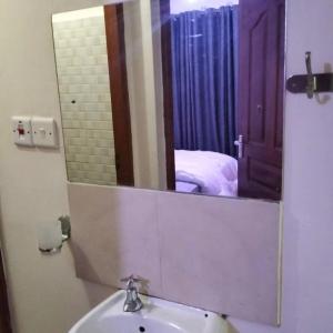Koupelna v ubytování Buruburu Airbnb