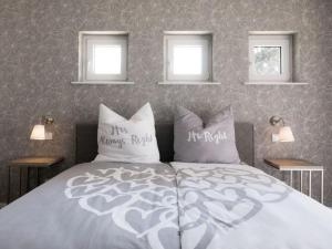 מיטה או מיטות בחדר ב-Casa sul Lago Modern retreat