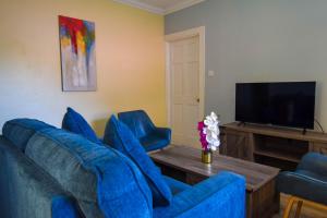 TV o dispositivi per l'intrattenimento presso Sea Piton View Apartment- Location, Convenience, Modern Living