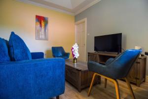 TV o dispositivi per l'intrattenimento presso Sea Piton View Apartment- Location, Convenience, Modern Living