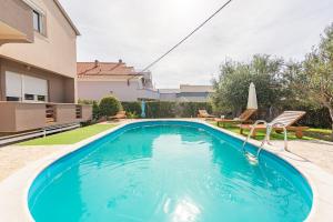 Bazén v ubytování Apartment Kiara with Pool nebo v jeho okolí