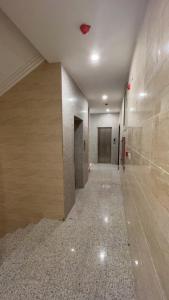 a hallway of a building with a hallway at دبليو تاون للشقق المخدومة - W Town Serviced Apartments in Jeddah
