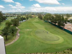 an overhead view of a golf course at Excellent 2bd apartment with a patio in Phuket