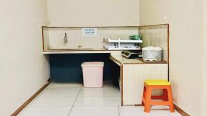 Kuchyň nebo kuchyňský kout v ubytování Guest House Nusa Indah Batu Malang