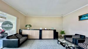 TV a/nebo společenská místnost v ubytování Guest House Nusa Indah Batu Malang