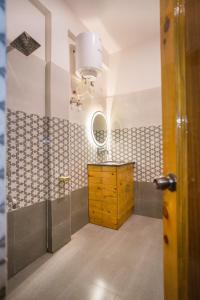 Vonios kambarys apgyvendinimo įstaigoje Tapovan Inn Hotel And Resort