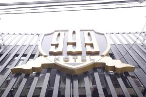 a sign on the side of a building at 999 Hotel in Angeles