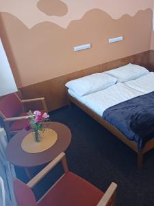 Voodi või voodid majutusasutuse Hotel Albert - RETRO toas
