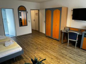 Un televizor și/sau centru de divertisment la Apartment Nordland für 2 Personen 402, 408, 409