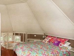 מיטה או מיטות בחדר ב-Casablanca Enchanted Cottage