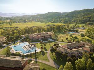an aerial view of a resort with a pool at Grecotel LUXME Costa Botanica in Acharavi