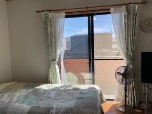 Cama o camas de una habitación en Condominium Agathanks - Vacation STAY 16291