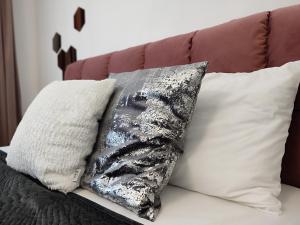 two pillows are sitting on a couch at Summer day Chernomorets in Chernomorets
