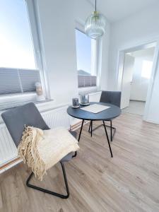 Posezení v ubytování Ferienzimmer auf dem Hof Postma